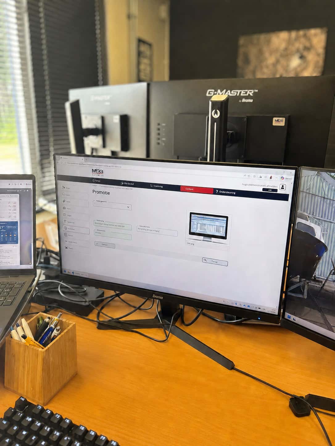 MSG CMS in gebruik op het scherm, met de beheerpagina voor promoties